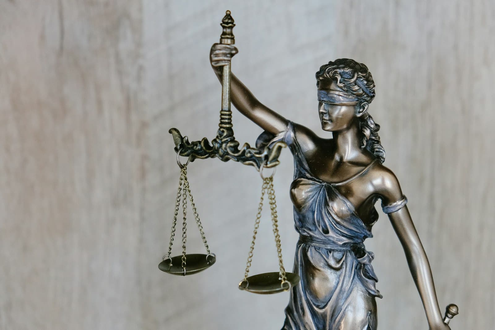 Legal recruitment stock photo with law books and justice scales