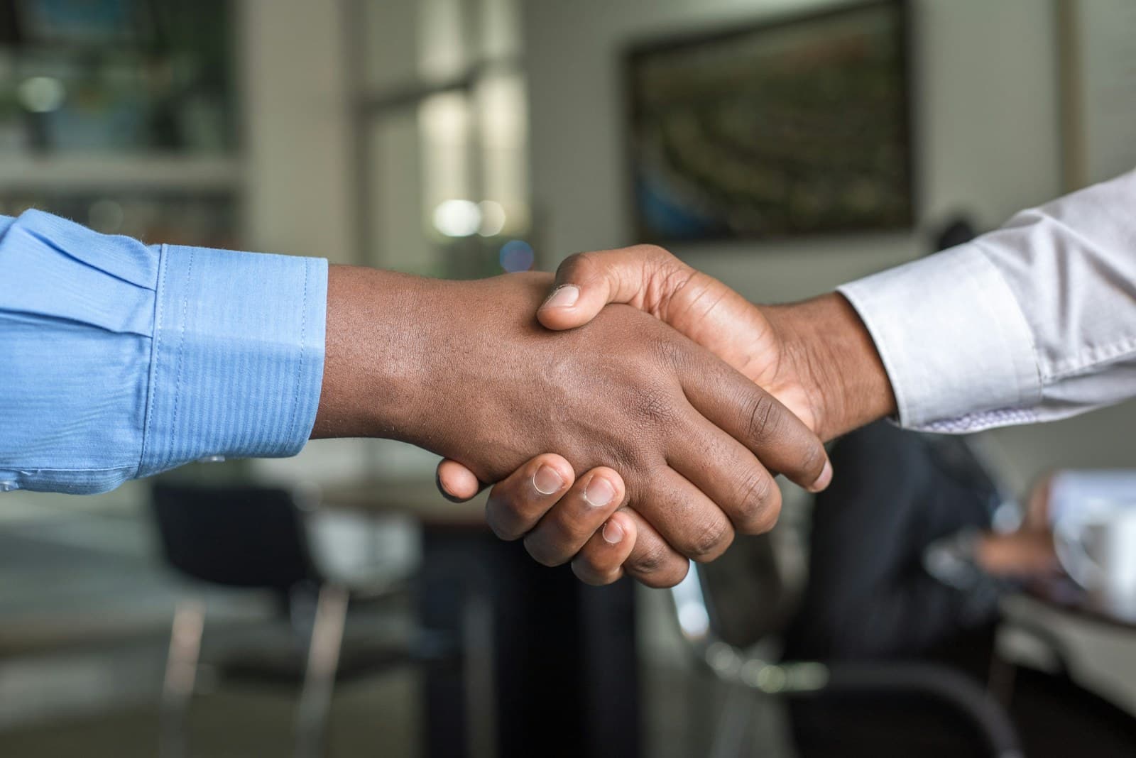 Onboarding stock photo with client partnership meeting
